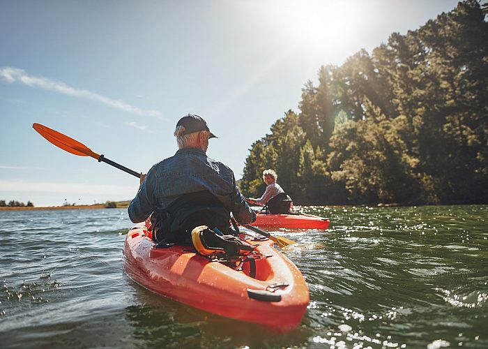 Two People Kayaking in the Sunlight