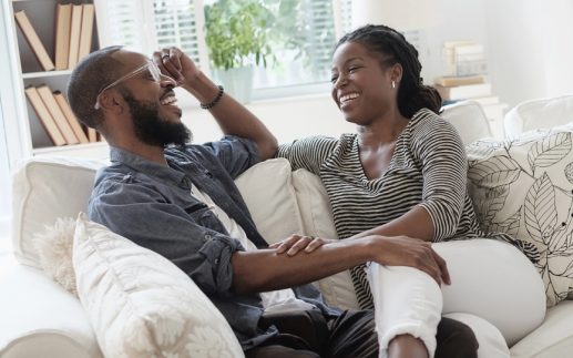 Couple Laughing on Couch